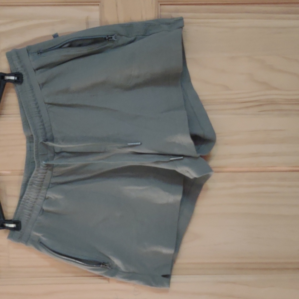 Green (Olive) Shorts with side zip pockets and drawstring